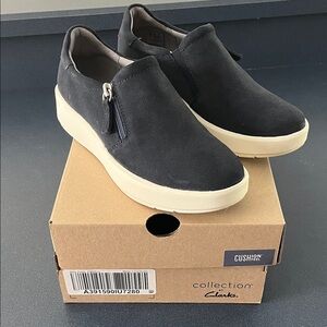 Clarks Navy Slip-On Shoes with cream Soles